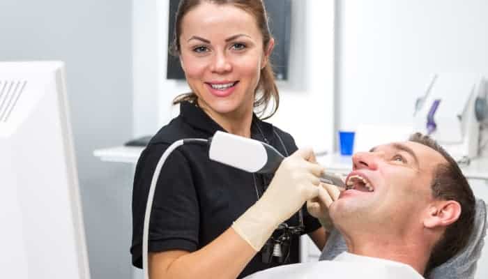 dental professional working on patient