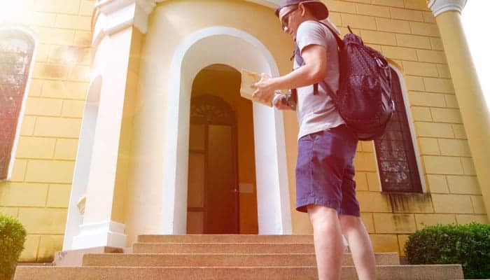 young man with backpack traveling