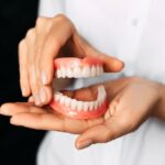 whitening your dentures, denture care, Cary Family Dental, Cary IL, denture cleaning, denture maintenance, ultrasonic cleaners, denture whitening solutions, white vinegar soak