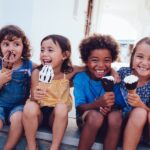 kids eating icecream in summer before kids dental cleaning in summer