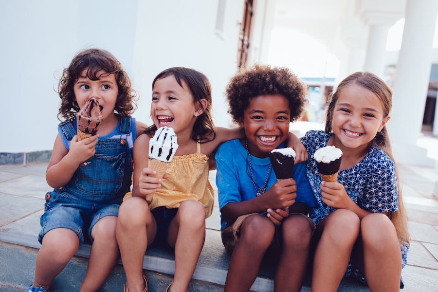 kids eating icecream in summer before kids dental cleaning in summer