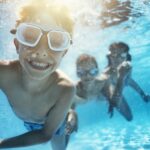 kids swimming in pool, can swimming make your teeth sensitive