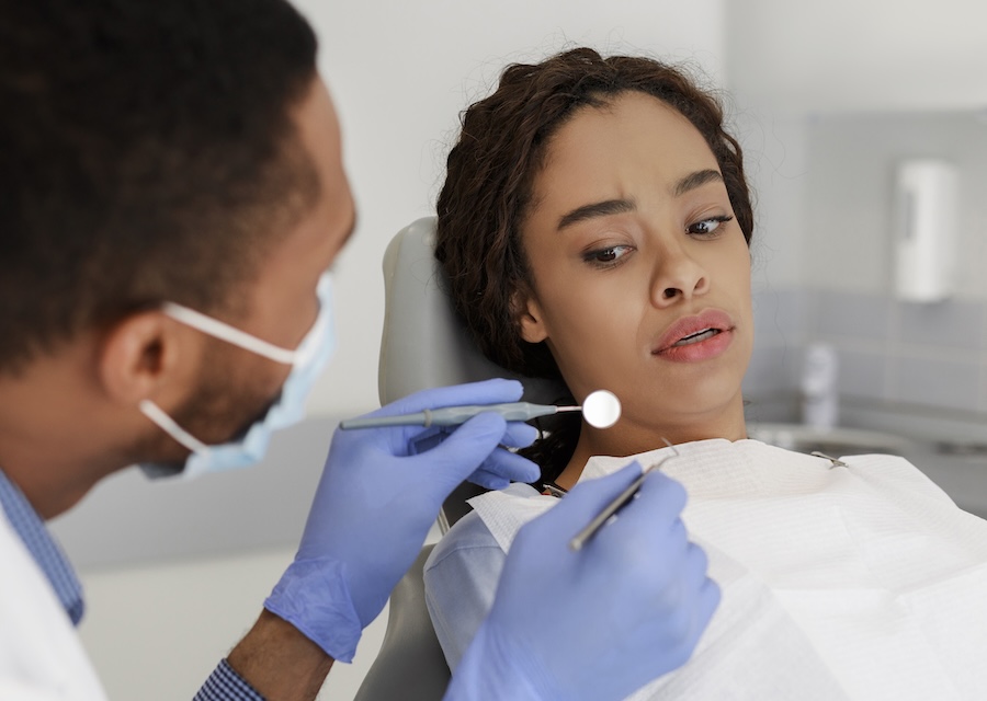 woman with dental anxiety in dental chair