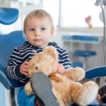 kids first dental visit, young child toddler at dentist