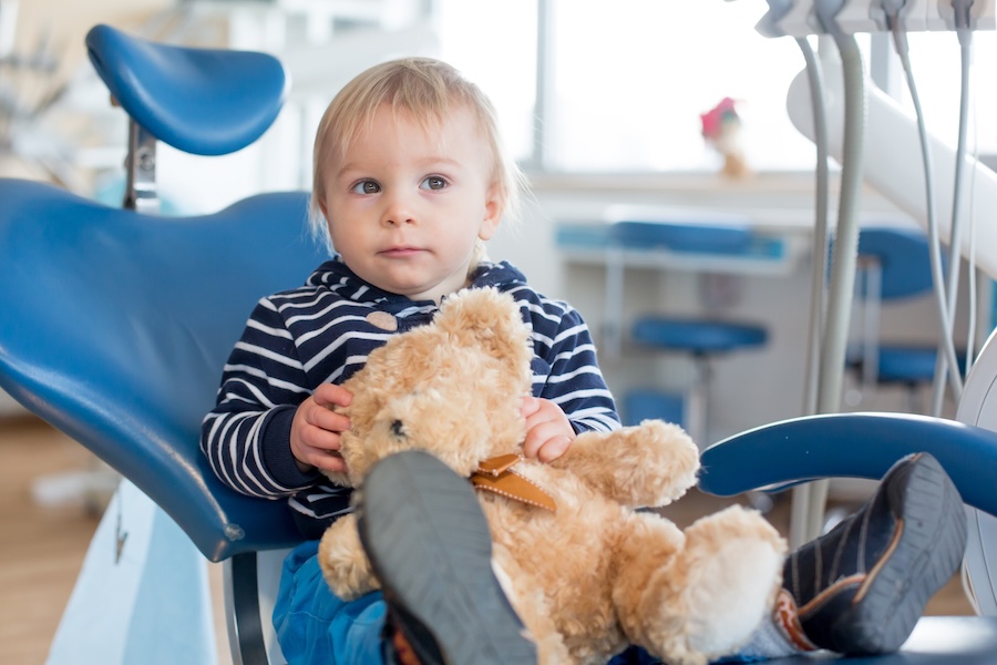 kids first dental visit, young child toddler at dentist