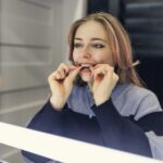 teen with invisalign clear aligners